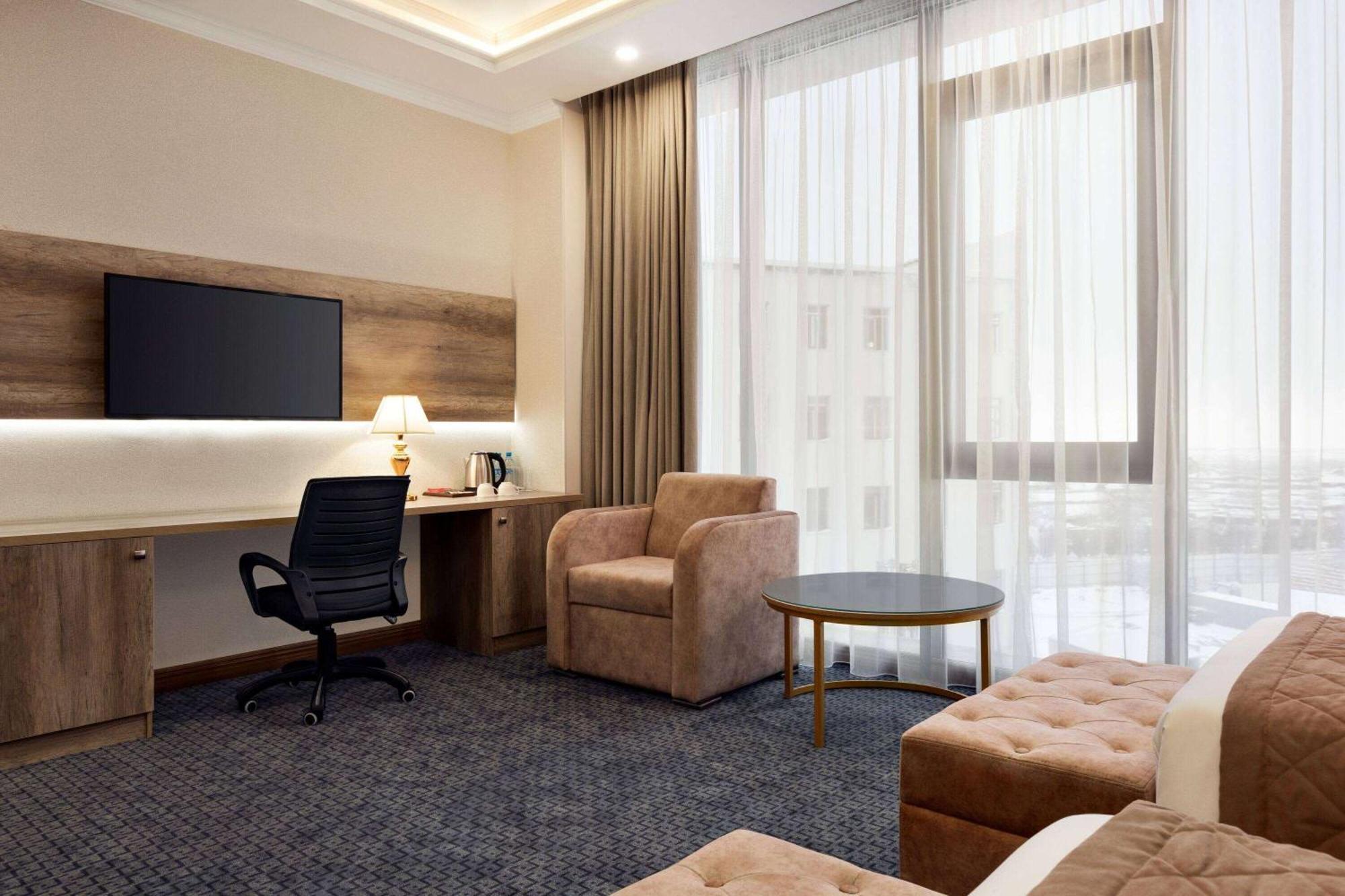 فندق Ramada By Wyndham شيمكنت المظهر الخارجي الصورة